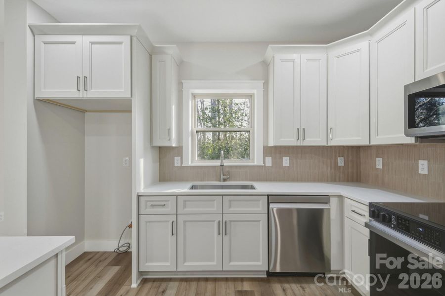 Furnished interior view inside a new home in , Concord (Image 10).
