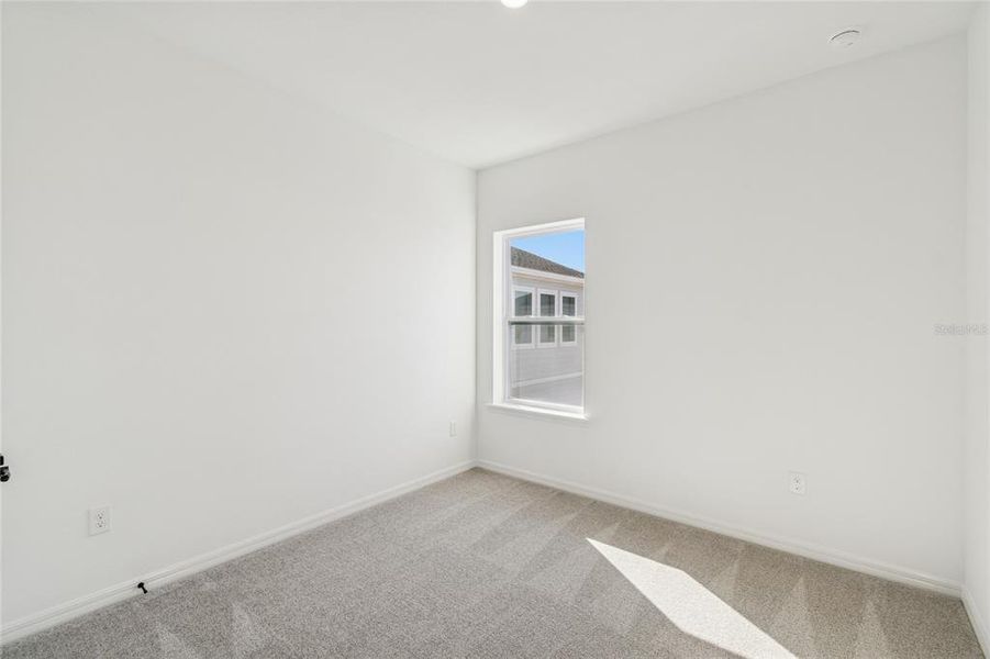 Spacious, unfurnished interior of a new home in Weslyn Park in Sunbridge 34', St. Cloud (Image 37).