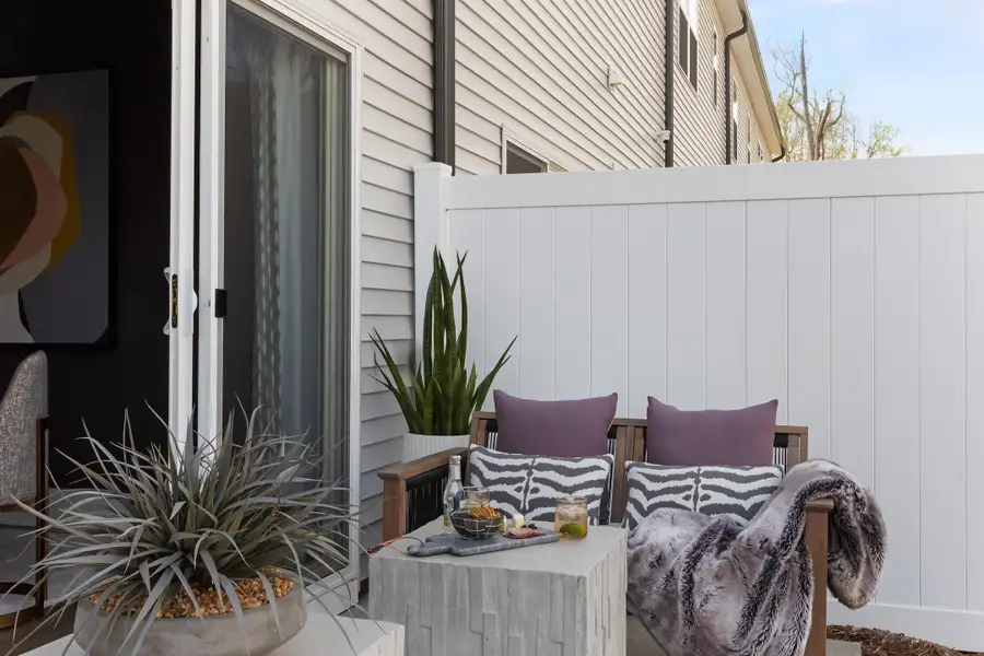 Exterior details and patio area of a home in Amplitude, Charlotte (Image 3).