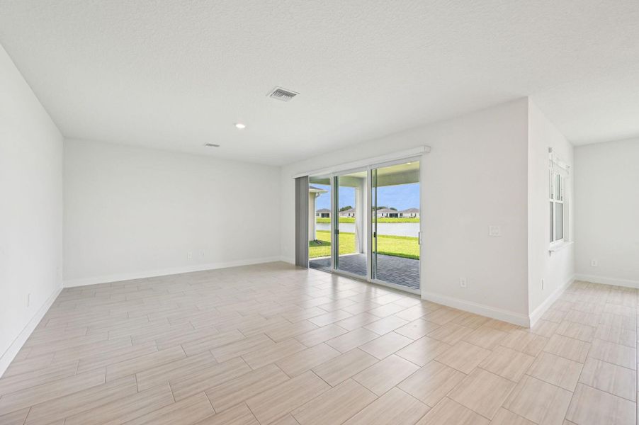 Furnished interior view inside a new home in Hampton Park - Signature Series, Vero Beach (Image 8). Furnished interior view inside a new home in Hampton Park - Signature Series, Vero Beach (Image 8).