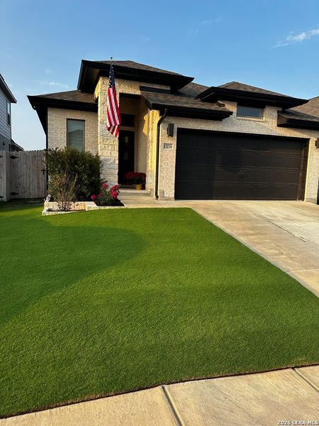 Front exterior of a new home in Veranda, San Antonio, TX, highlighting curb appeal (Image 2). Front exterior of a new home in Veranda, San Antonio, TX, highlighting curb appeal (Image 2).