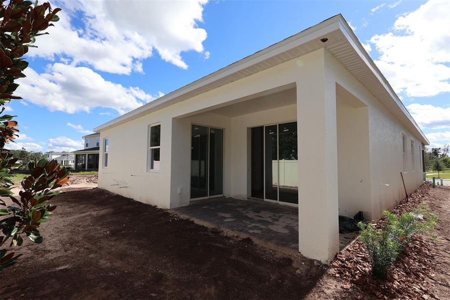 Exterior details and patio area of a home in Bay Lake Farms, St. Cloud (Image 9).