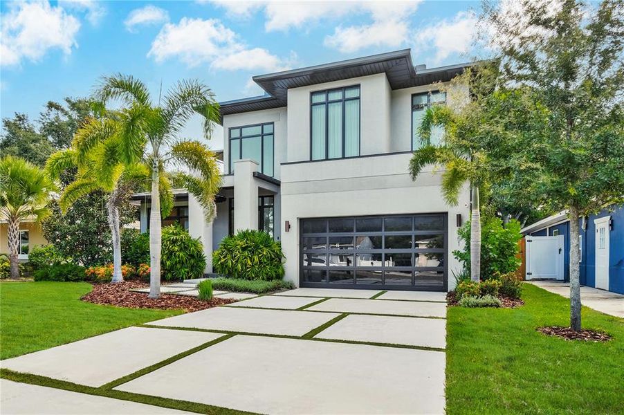 Front exterior of a new home in , Dunedin, FL, highlighting curb appeal (Image 24).