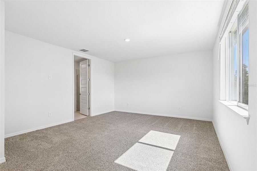 Spacious, unfurnished interior of a new home in The Grove at Stuart Crossing - Signature Series, Bartow (Image 29). Spacious, unfurnished interior of a new home in The Grove at Stuart Crossing - Signature Series, Bartow (Image 29).