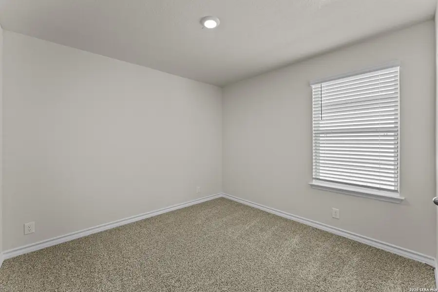 Spacious, unfurnished interior of a new home in Brookstone Creek, San Antonio (Image 11).