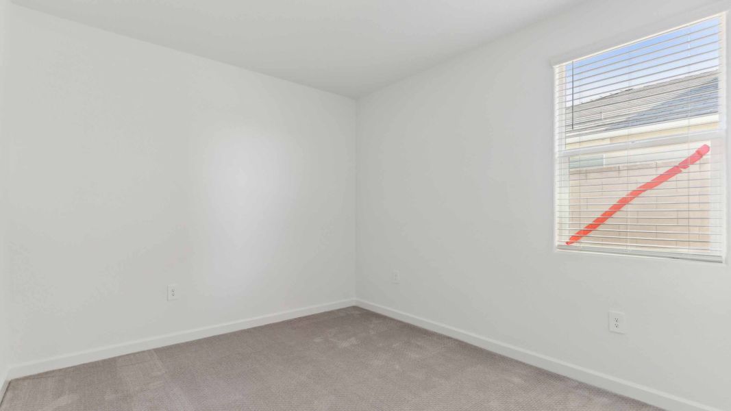 Spacious, unfurnished interior of a new home in Quail Ranch, San Tan Valley (Image 22).