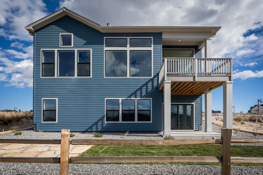 Exterior details and patio area of a home in Cloverleaf - Pinnacle Collection, Monument (Image 4).