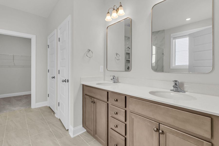 Furnished interior view inside a new home in Tidewater at Lakes of Cane Bay, Summerville (Image 7). Furnished interior view inside a new home in Tidewater at Lakes of Cane Bay, Summerville (Image 7).
