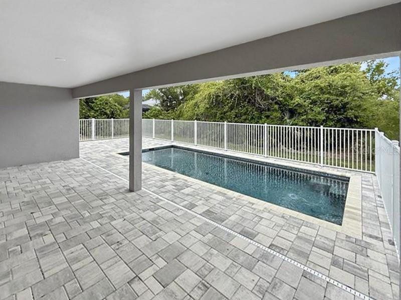 Exterior details and patio area of a home in , Port Charlotte (Image 14).