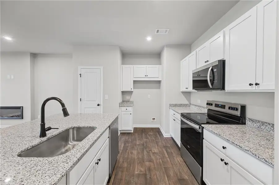 Furnished interior view inside a new home in Village Green, Adairsville (Image 7).