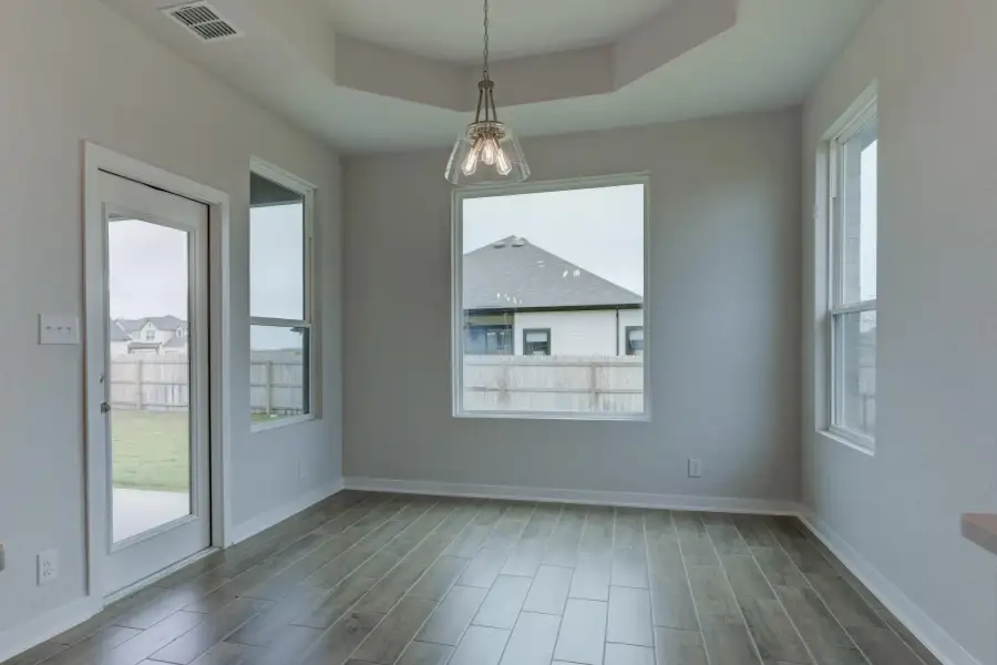 Representative unfurnished interior of a home built from the Guadalupe by Ashton Woods in Saddlebrook Ranch, Schertz (Image 23).