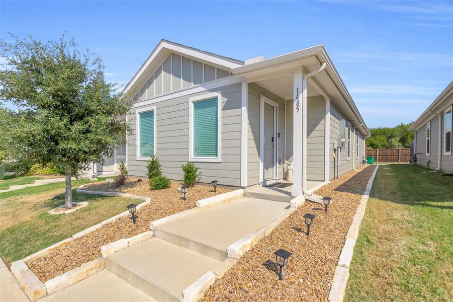 View of front of property with board and batten siding