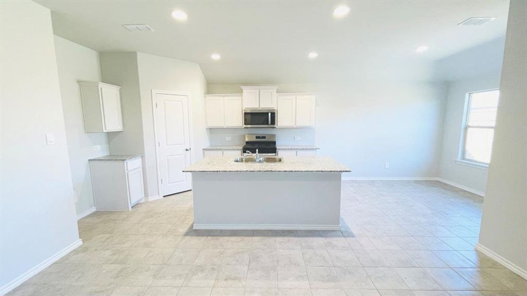 Kitchen - All Home and community information, including pricing, included features, terms, availability and amenities, are subject to change at any time without notice or obligation. All Drawings, pictures, photographs, video, square footages, floor plans, elevations, features, colors and sizes are approximate for illustration purposes only and will vary from the homes as built.