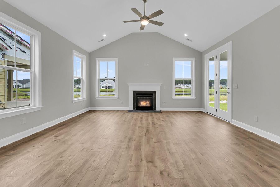 Spacious, unfurnished interior of a new home in Tidewater at Lakes of Cane Bay, Summerville (Image 23).