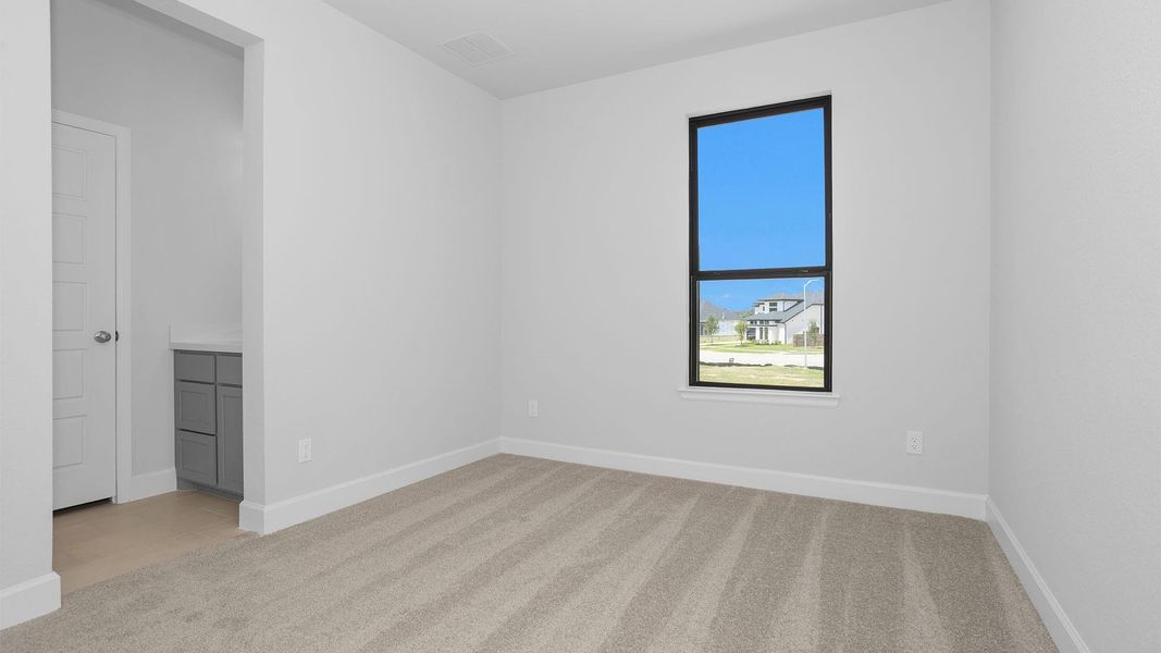 Spacious, unfurnished interior of a new home in Legacy Prairie at Katy Court, Katy (Image 12).