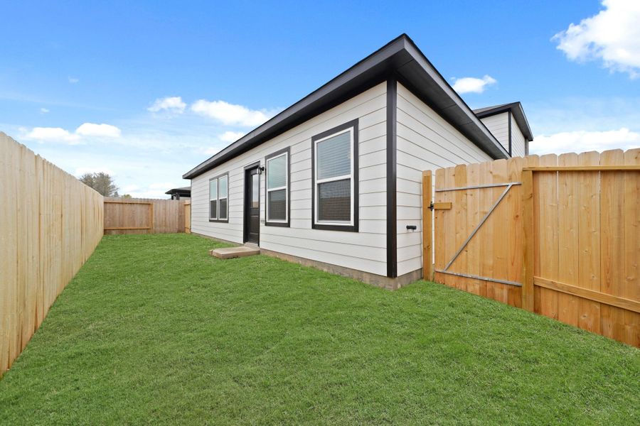 Exterior details and patio area of a home in Reveille Estates, Bryan (Image 3). Exterior details and patio area of a home in Reveille Estates, Bryan (Image 3).
