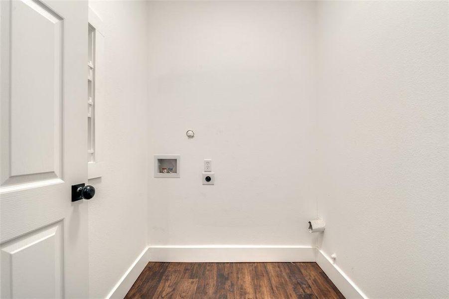 Washroom with hookup for a washing machine, dark hardwood / wood-style flooring, gas dryer hookup, and electric dryer hookup