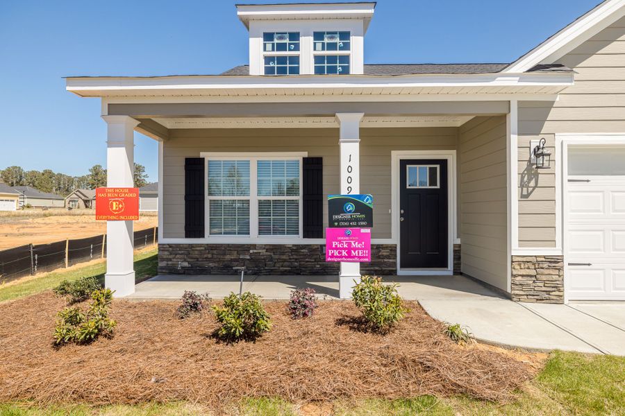 Front exterior of a new home in Millbrook, Thomson, GA, highlighting curb appeal (Image 20).