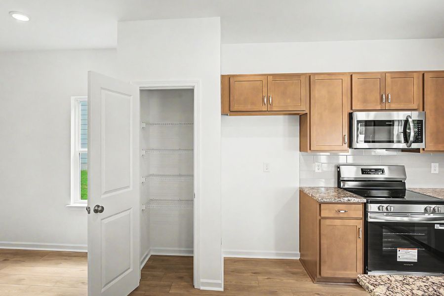 Furnished interior view inside a new home in Ironhorse, Dickson (Image 7).