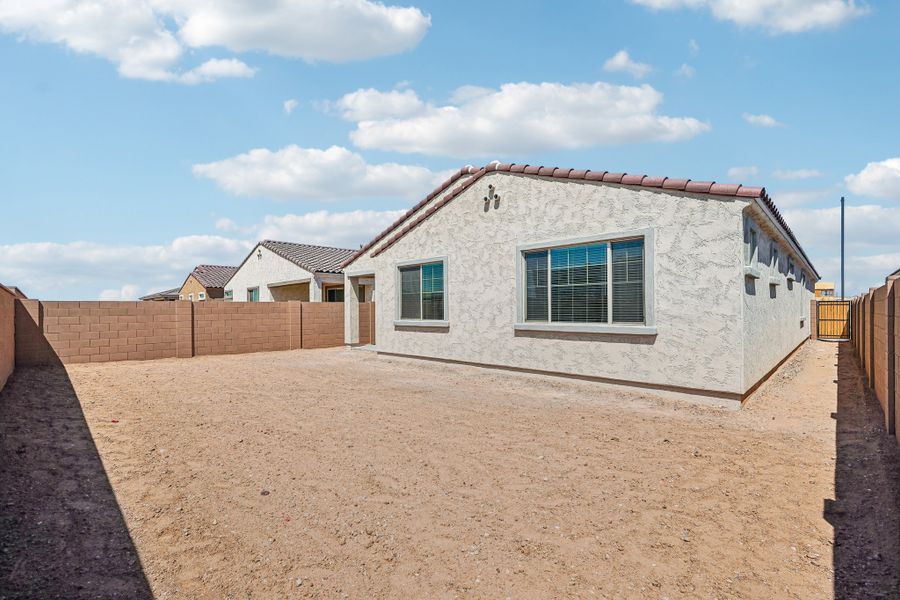Exterior details and patio area of a home in Hawes Crossing, Mesa (Image 25).