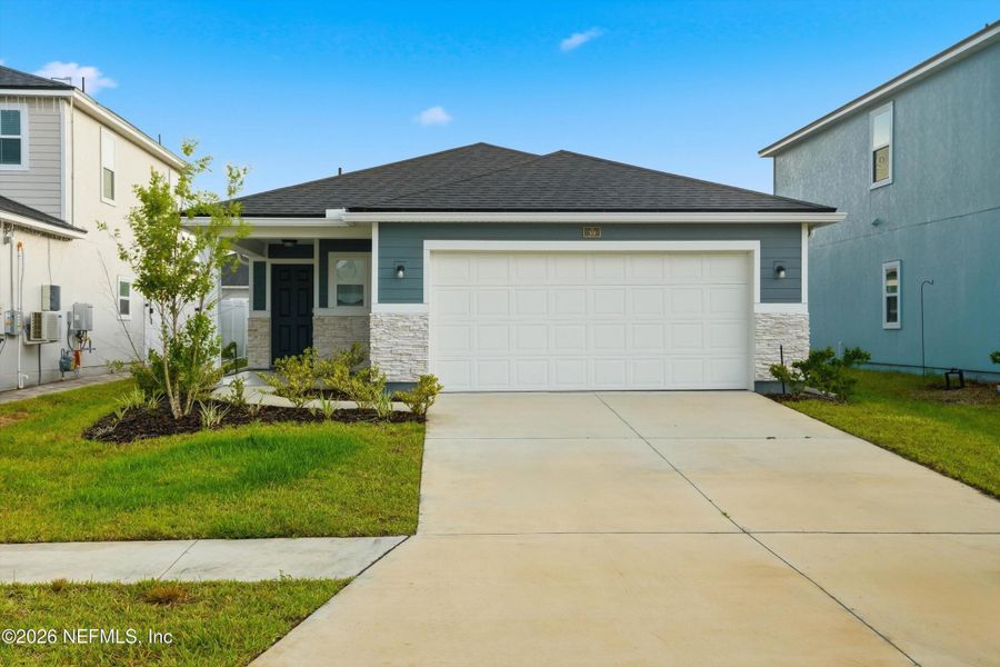 Front exterior of a new home in , St. Augustine, FL, highlighting curb appeal (Image 25).