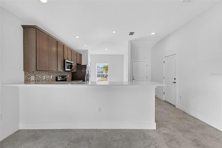 Furnished interior view inside a new home in , Port Charlotte (Image 7). Furnished interior view inside a new home in , Port Charlotte (Image 7).
