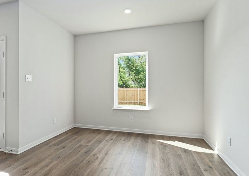 The dining room has a large window that lets in great, natural light.