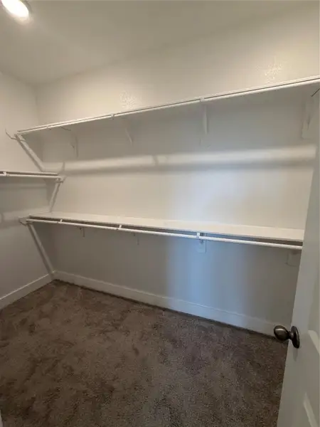Space, style & storage—this walk-in closet has it all!