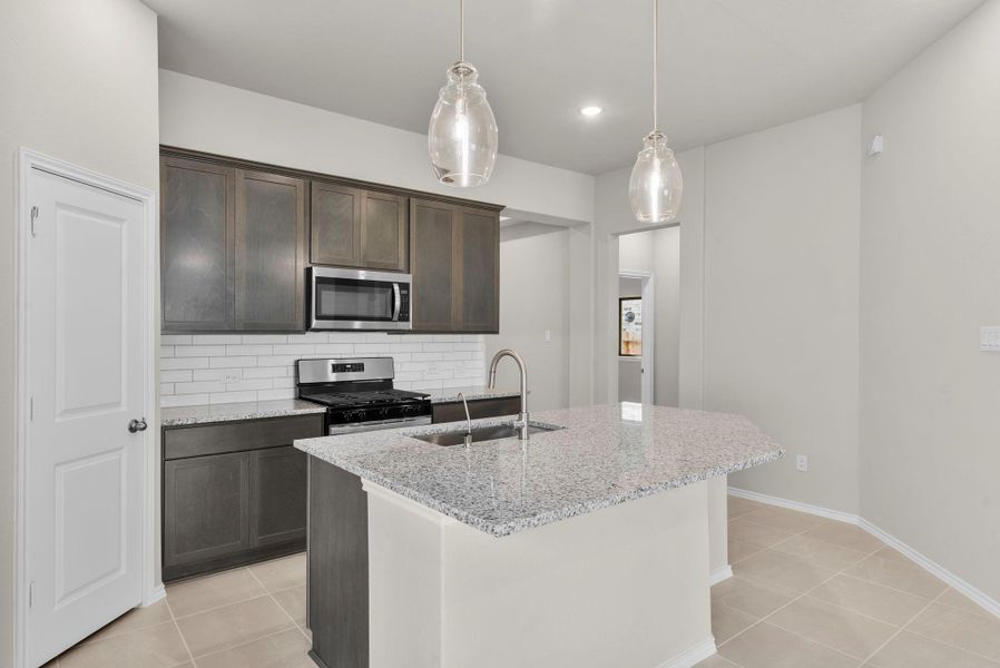 Furnished interior view inside a new home in Grand Central Park, Conroe (Image 12).