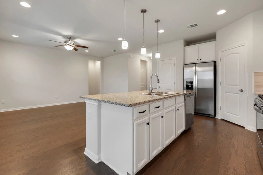Representative furnished interior of a home built from the Cambridge by Ashton Woods in Lagos Reserve, Manor (Image 8). Representative furnished interior of a home built from the Cambridge by Ashton Woods in Lagos Reserve, Manor (Image 8).