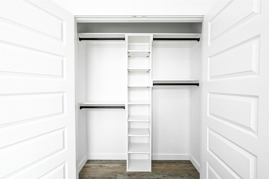 Ample storage solutions define this practical and well-organized closet. Ample storage solutions define this practical and well-organized closet.
