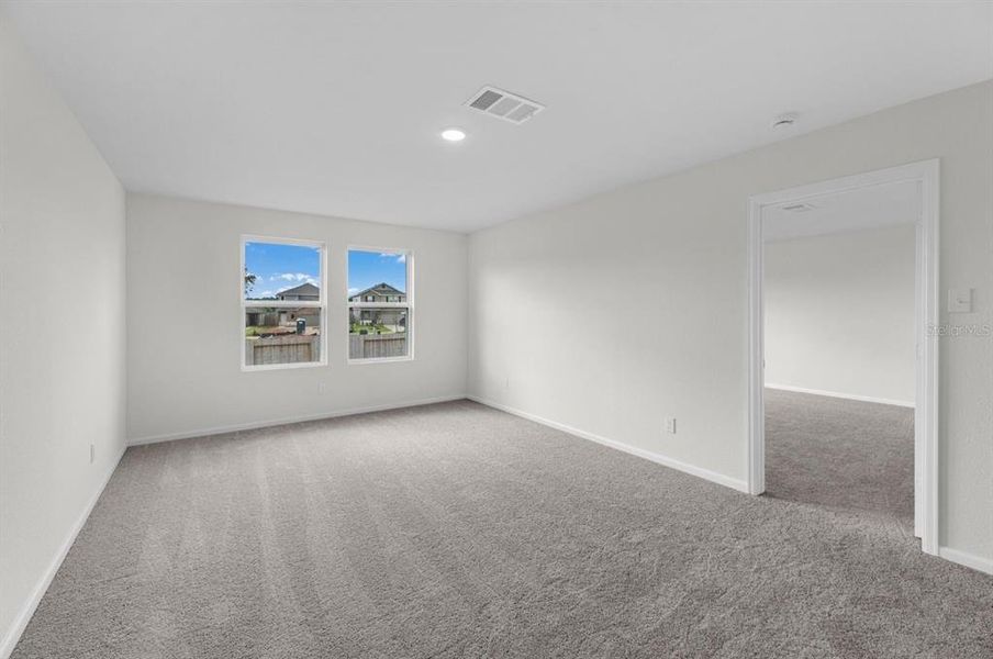 Spacious, unfurnished interior of a new home in Oakfield Lakes, Parrish (Image 14).