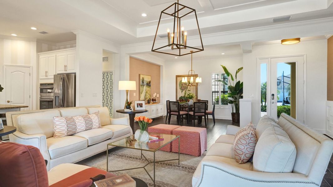 Representative furnished interior of a home built from the Sanibel 2 by Neal Communities in SkySail, Naples (Image 14).