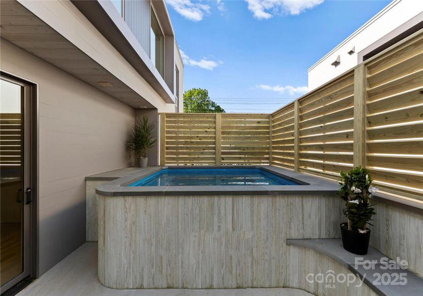 Exterior details and patio area of a home in , Charlotte (Image 26).