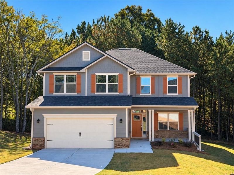 Front exterior of a new home in Magnolia Villas, Cornelia, GA, highlighting curb appeal (Image 23).