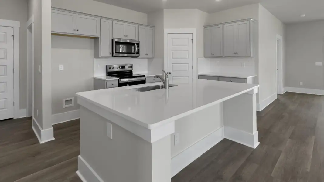 Furnished interior view inside a new home in The Retreat at Indigo Preserve Townhomes, Leland (Image 4).
