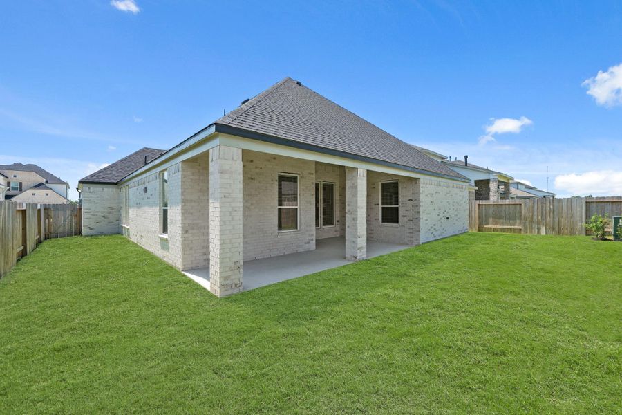 Front exterior of a new home in Briarwood Crossing, Rosenberg, TX, highlighting curb appeal (Image 17).