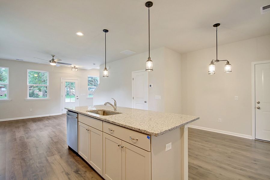 Nichlos Kitchen Overlooking Living and Breakfast Area