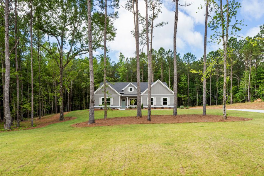 Front exterior of a new home in Flint Farms, Concord, GA, highlighting curb appeal (Image 1).