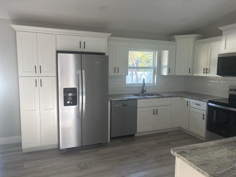 Furnished interior view inside a new home in , Dunnellon (Image 9).