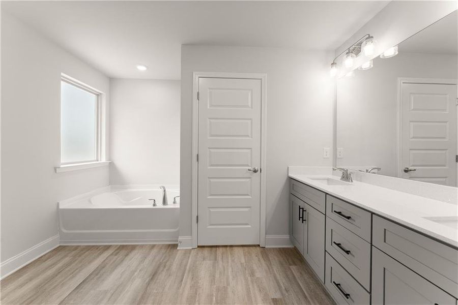 Furnished interior view inside a new home in Magnolia Villas, Cornelia (Image 11).