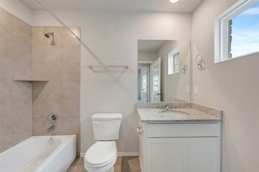 Furnished interior view inside a new home in Heritage, Dripping Springs (Image 10).
