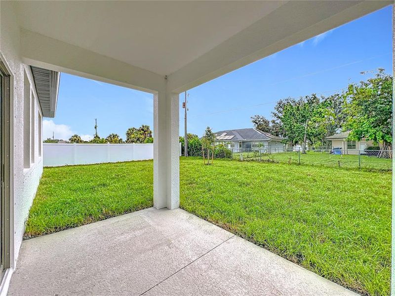 Exterior details and patio area of a home in , North Port (Image 23).