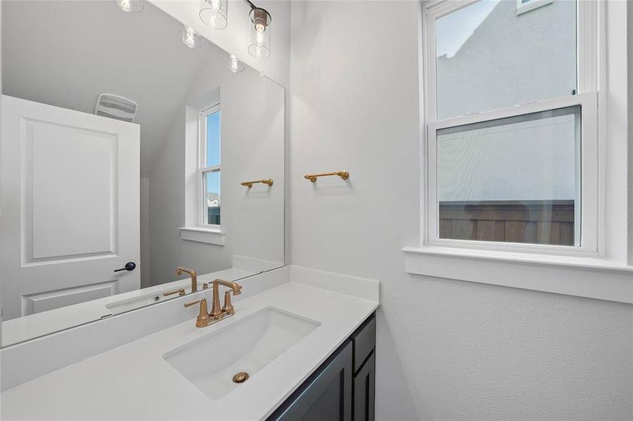 Bathroom featuring vanity