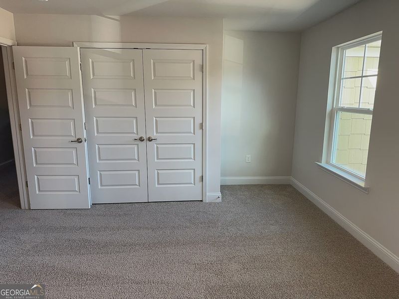 Furnished interior view inside a new home in Canterbury Villas, Carrollton (Image 8).