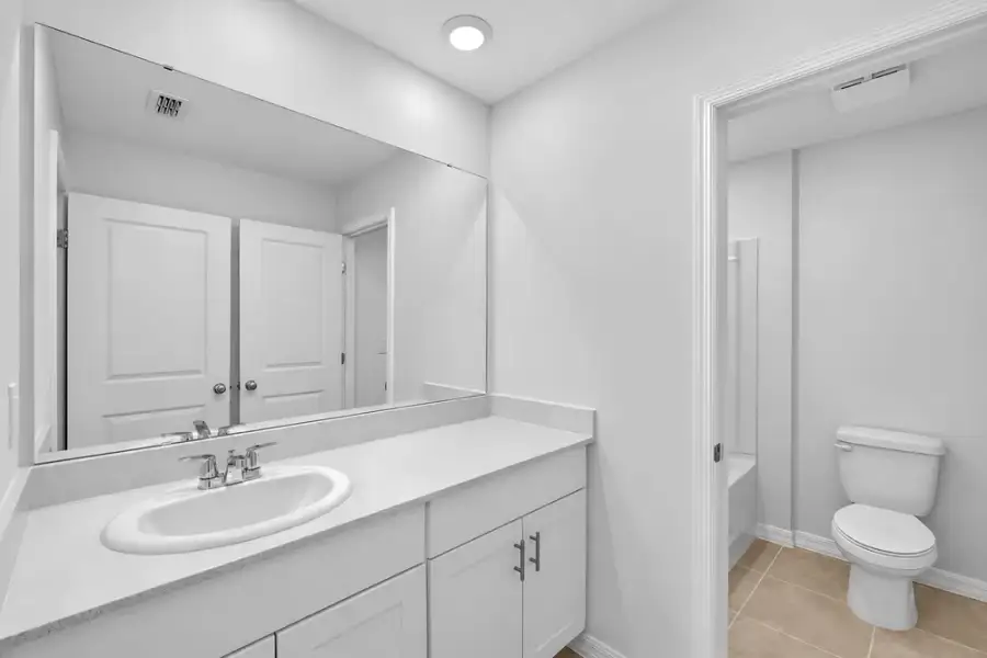 Representative furnished interior of a home built from the Dove by Taylor Morrison in Azure at Solaeris, Port St. Lucie (Image 6).