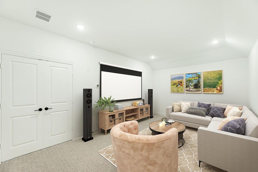 Media room with large projection screen, floor speakers, sectional sofa, and carpeted floors