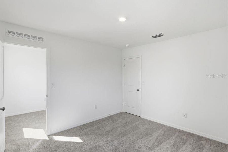 Spacious, unfurnished interior of a new home in Waterstone, Groveland (Image 34).