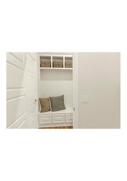 Mudroom featuring hardwood / wood-style floors