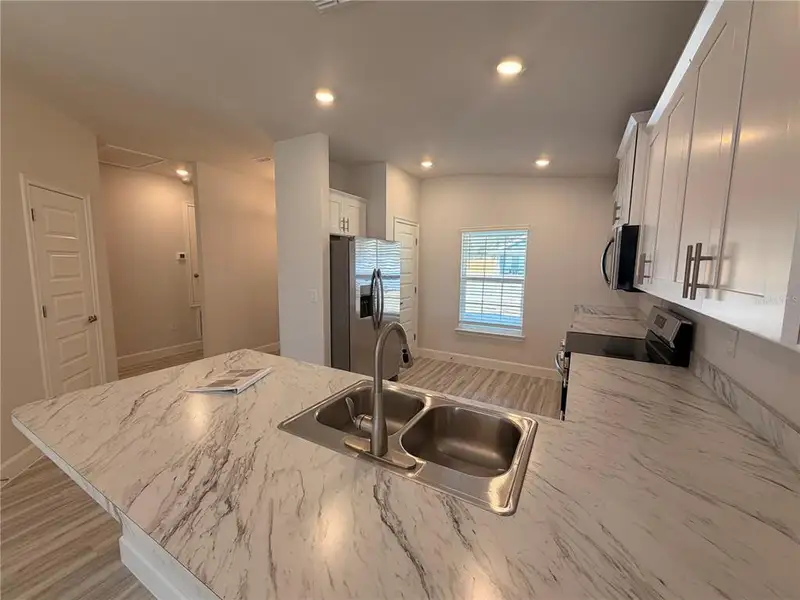 Furnished interior view inside a new home in Rolling Hills, Bell (Image 5). Furnished interior view inside a new home in Rolling Hills, Bell (Image 5).